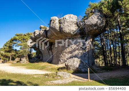 Unique rock formations in La Ciudad Encantada or Enchanted City near Cuenca, Spain, Castilla la Mancha Unique rock formations in La Ciudad Encantada or Enchanted City near Cuenca, Spain, Castilla la Mancha 85694400