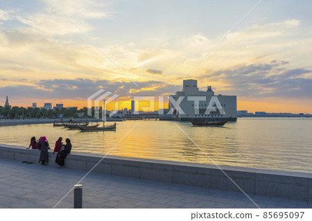 Doha park and Museum of Islamic Art during sunset, Qatar. 85695097