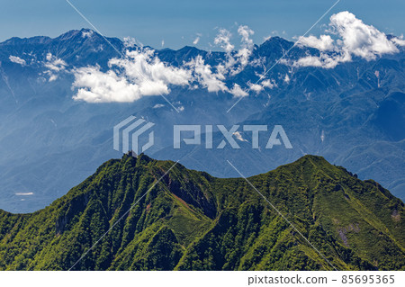 Mt. Gongen and the mountains of the Southern Alps seen from the Yatsugatake mountain range and Mt. Aka 85695365