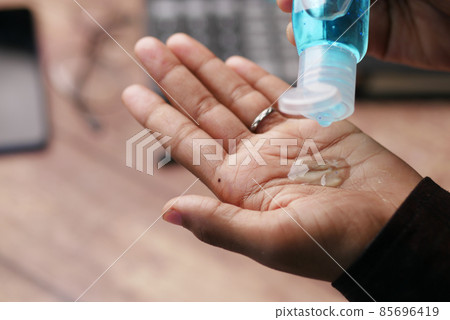 Using sanitizer liquid for preventing corona virus Using sanitizer liquid for preventing corona virus 85696419