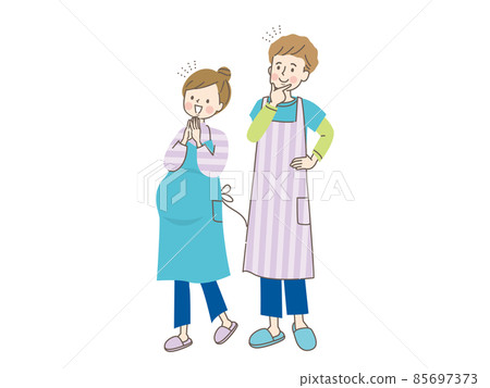 Pregnant smiling woman and husband in an apron 85697373