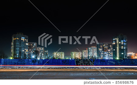 Novokuznetsk, Russia, 02.01.2022: night view fenced territory of the central district of the city 85698676