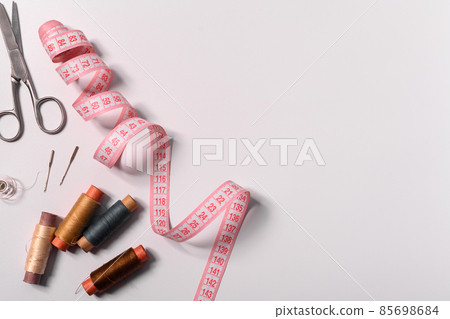 sewing tools and accessories on a white background. copy space 85698684