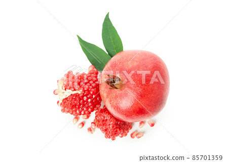 Ripe fresh pomegranate isolated on white background Ripe fresh pomegranate isolated on white background 85701359