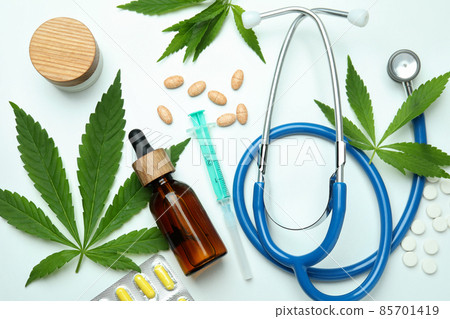 Medicinal cannabis concept on white background, close up Medicinal cannabis concept on white background, close up 85701419