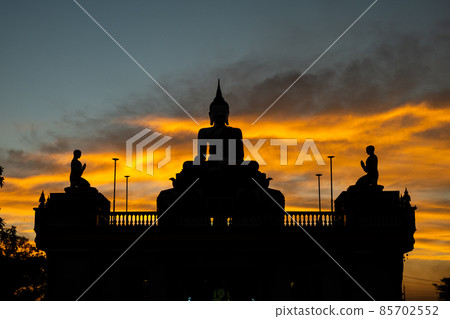 silhouette of a buddha statue silhouette of a buddha statue 85702552
