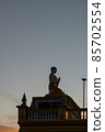 silhouette of a buddha statue 85702554