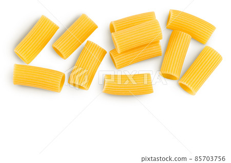 raw italian Rigatoni pasta isolated on white background with clipping path and full depth of field. Top view with copy space for your text. Flat lay raw italian Rigatoni pasta isolated on white background with clipping path and full depth of field. Top view with copy space for your text. Flat lay 85703756