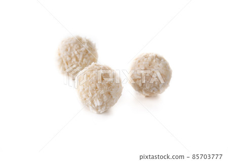 Homemade coconut balls in crystal bowl Homemade coconut balls in crystal bowl 85703777