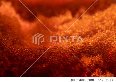 Tobiko, flying fish roe full frame macro close up. Sea of red caviar 85707045