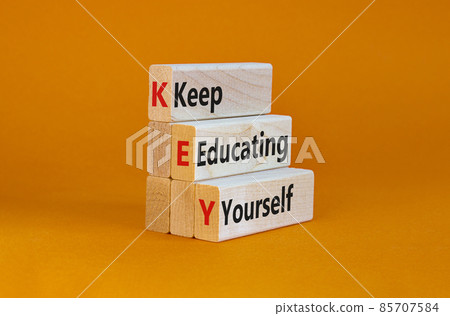 KEY, keep educating yourself symbol. Wooden blocks with words 'KEY, keep educating yourself'. Beautiful orange background, copy space. Business, educational and KEY, keep educating yourself concept. KEY, keep educating yourself symbol. Wooden blocks with words 'KEY, keep educating yourself'. Beautiful orange background, copy space. Business, educational and KEY, keep educating yourself concept. 85707584