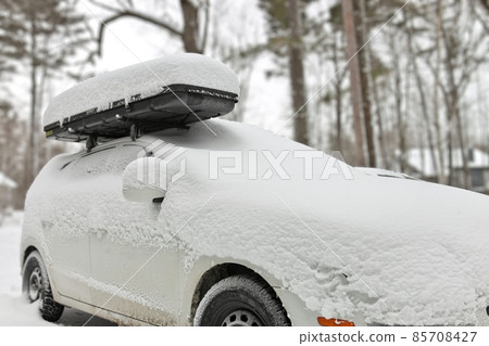 Car covered in deep snow Car covered in deep snow 85708427