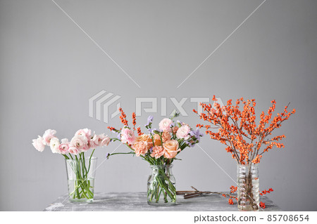 Finished flower arrangement in a vase for home. Flowers bunch, set for interior. Fresh cut flowers for decoration home. European floral shop. Delivery fresh cut flower. Finished flower arrangement in a vase for home. Flowers bunch, set for interior. Fresh cut flowers for decoration home. European floral shop. Delivery fresh cut flower. 85708654