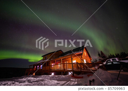 Strong Aurora over sky at Fairbanks, Alaska 85709963