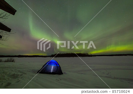Beauitful aurora over the night sky with a blue tent below at Chena Lakes Beauitful aurora over the night sky with a blue tent below at Chena Lakes 85710024