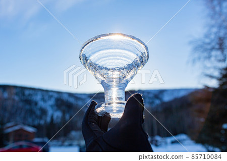 Hand holding an icy cup Hand holding an icy cup 85710084
