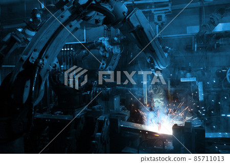 welding robot in the automotive parts industry, The movement of the robot welding in auto parts factory. welding robot in the automotive parts industry, The movement of the robot welding in auto parts factory. 85711013