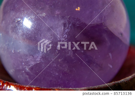 Close up of Amethyst Quartz Crystal ball 85713136