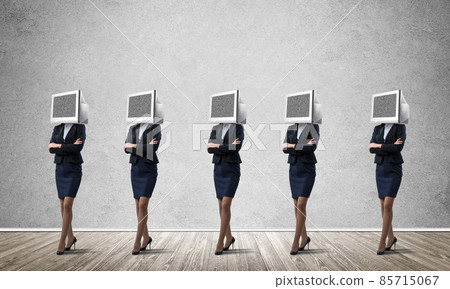 Business women with monitors instead of head. Business women with monitors instead of head. 85715067