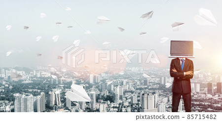 Businessman with laptop instead of head. 85715482