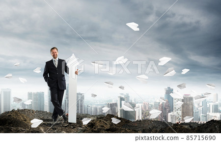 Conceptual image of businessman in ruins Conceptual image of businessman in ruins 85715690