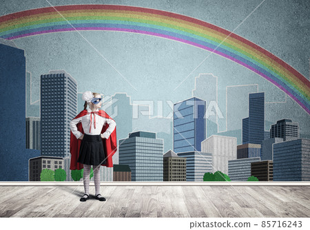 Girl power concept with cute kid guardian against drawn cityscape background. Mixed media Girl power concept with cute kid guardian against drawn cityscape background. Mixed media 85716243