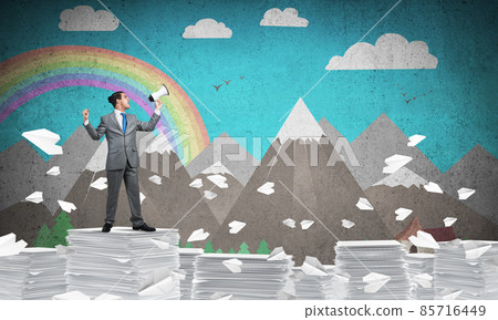 Businessman standing with megaphone. Businessman standing with megaphone. 85716449