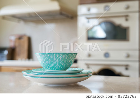 tableware on a blurred background of vintage kitchen interior - selective focus tableware on a blurred background of vintage kitchen interior - selective focus 85722762