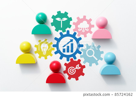 Teamwork and growth strategy. A bird's-eye view of human-shaped blocks and gear icons in various colors. 85724162