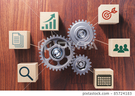 Image of strategic business management. A bird's-eye view of building blocks with gears and icons. Image of strategic business management. A bird's-eye view of building blocks with gears and icons. 85724183