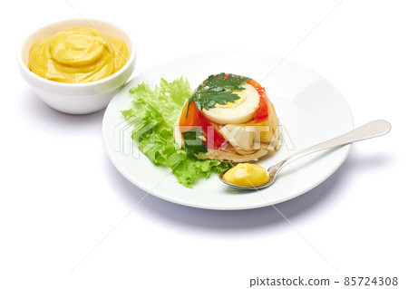 Delicious chicken aspic on a plate isolated on white background Delicious chicken aspic on a plate isolated on white background 85724308