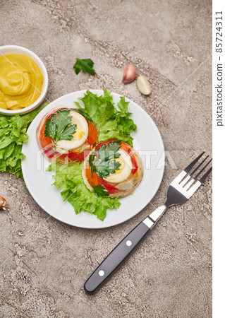Portion of delicious chicken aspic on a plate isolated on concrete table 85724311