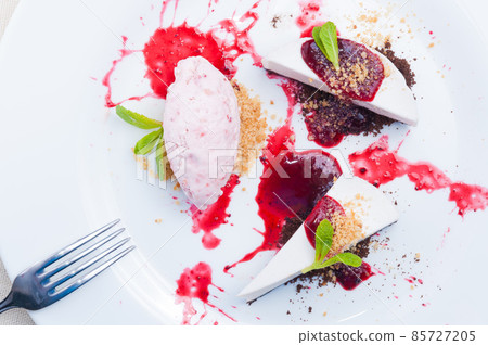 lavender cheesecake with strawberry and hibiscus ice cream. top view lavender cheesecake with strawberry and hibiscus ice cream. top view 85727205