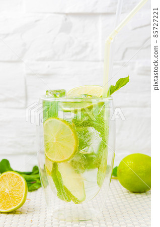 lemonade with lime mint on a light background lemonade with lime mint on a light background 85727221