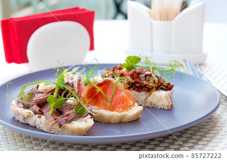 assorted bruschetta on a plate assorted bruschetta on a plate 85727222