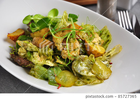 warm salad with beef, chicken, pork and vegetables warm salad with beef, chicken, pork and vegetables 85727365