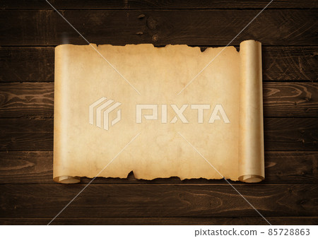 Old mediaeval paper sheet. Horizontal parchment scroll on a wood board 85728863