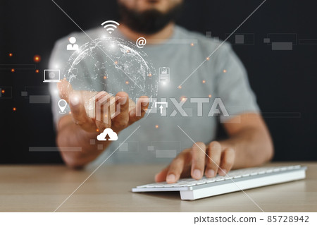 Businessman with global internet connection in a hand. Businessman with global internet connection in a hand. 85728942