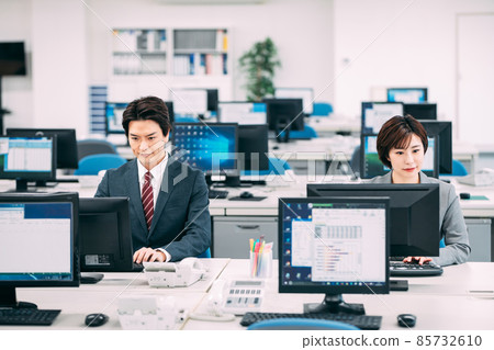 A businessman doing desk work in the office A businessman doing desk work in the office 85732610