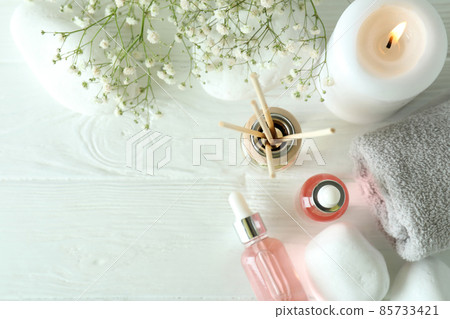 Aromatic concept with diffuser on white wooden table Aromatic concept with diffuser on white wooden table 85733421