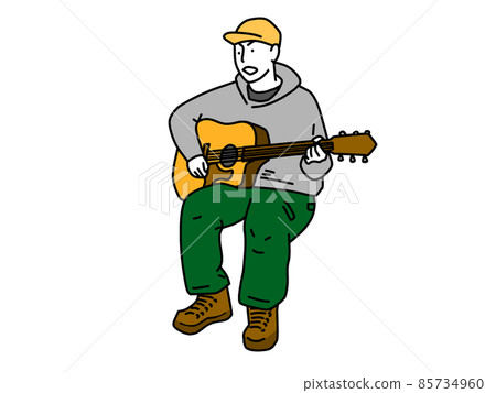 An older brother in a hat who sits and plays the guitar An older brother in a hat who sits and plays the guitar 85734960