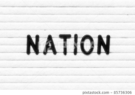Black alphabet letter in word nation on white felt board background 85736306