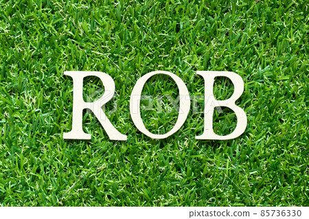 Alphabet letter in word ROB (Abbreviation of Rhythm of business) on green grass background Alphabet letter in word ROB (Abbreviation of Rhythm of business) on green grass background 85736330