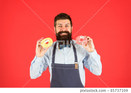 Doughnuts delivery. skilled baker with donut. funny  85737109