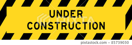 Yellow and black color with line striped label banner with word under construction 85739030