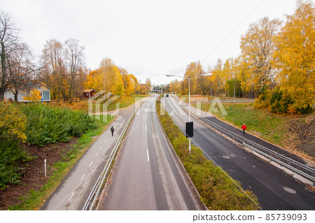 An autumn road in Finland, top view. An autumn road in Finland, top view. 85739093