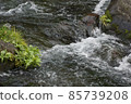Flow of mountain river in winter 85739208
