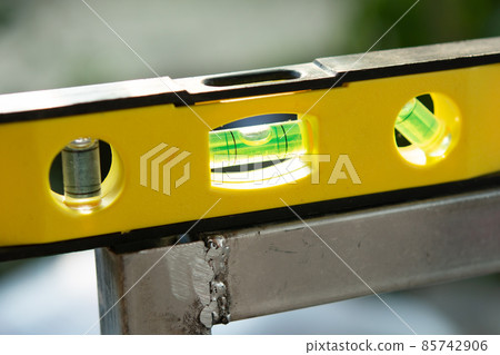 Spirit level or construction water level on steel pipe Spirit level or construction water level on steel pipe 85742906