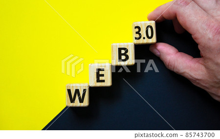 WEB 3.0 symbol. Wooden cubes with concept words WEB 3.0. Beautiful yellow and black background, copy space. Businessman hand. Business, technology web3 and WEB 3.0 concept. WEB 3.0 symbol. Wooden cubes with concept words WEB 3.0. Beautiful yellow and black background, copy space. Businessman hand. Business, technology web3 and WEB 3.0 concept. 85743700