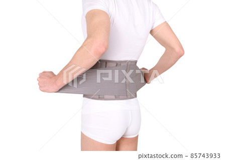 Orthopedic lumbar corset on the human body. Back brace, waist support belt for back. Posture Corrector For Back Clavicle Spine. Post-operative Hernia Pregnant and Postnatal Lumbar brace after surgery. 85743933
